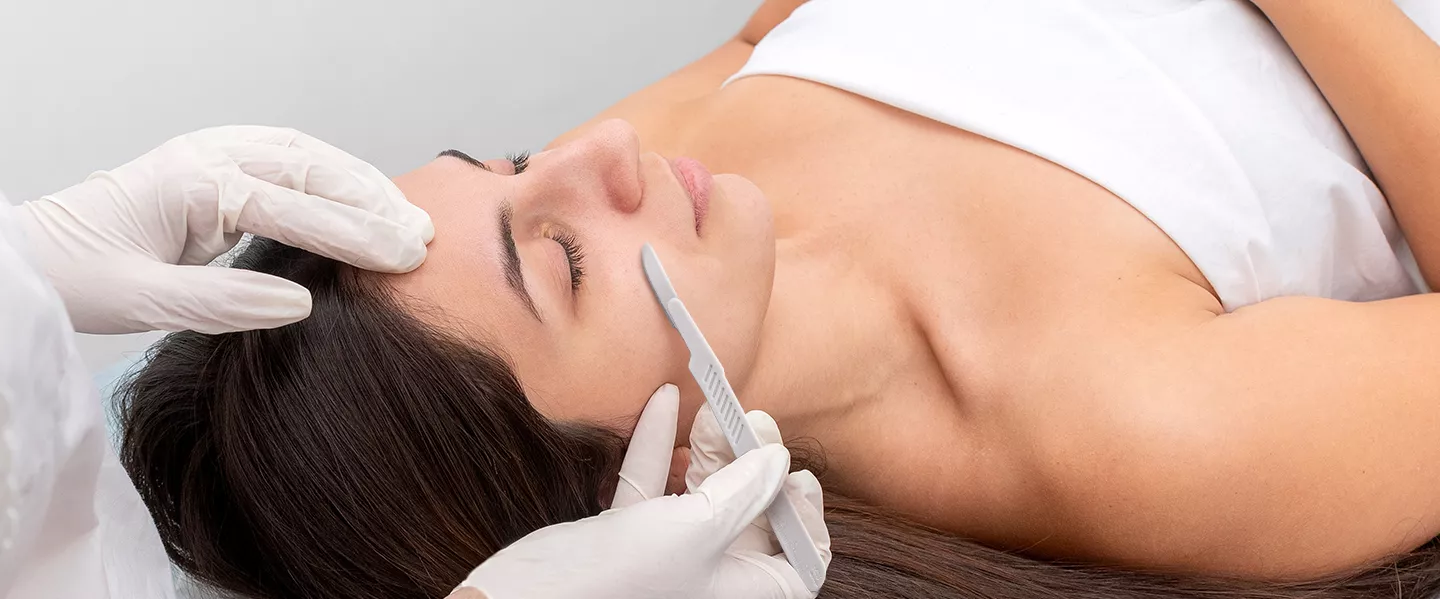 woman getting a dermaplaning treatment